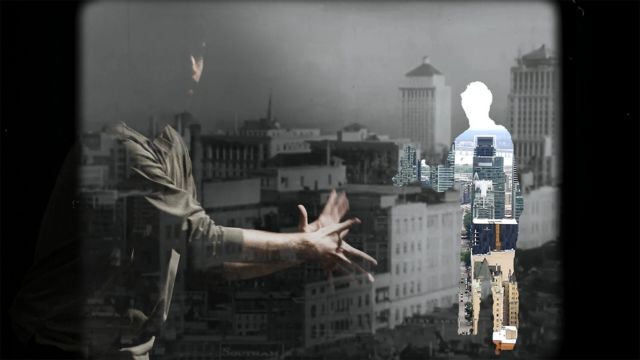 a composite image including a man's reflection and a city skyline with a section in the shape of a person removed from it